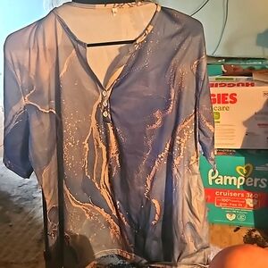 Woman's top blues ,whites,creme colors